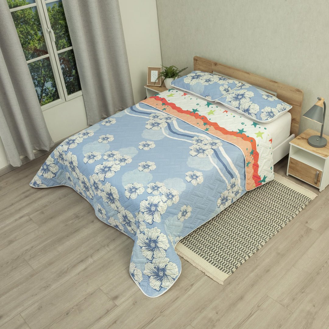 Cubrelecho Doble Faz Ecos de Cielo Naranja y Azul para Cama Doble 140 X 190 Cm Prensado de Estrellas Y Flores - TENDIDOS Y CUBRELECHOS | Bylmo