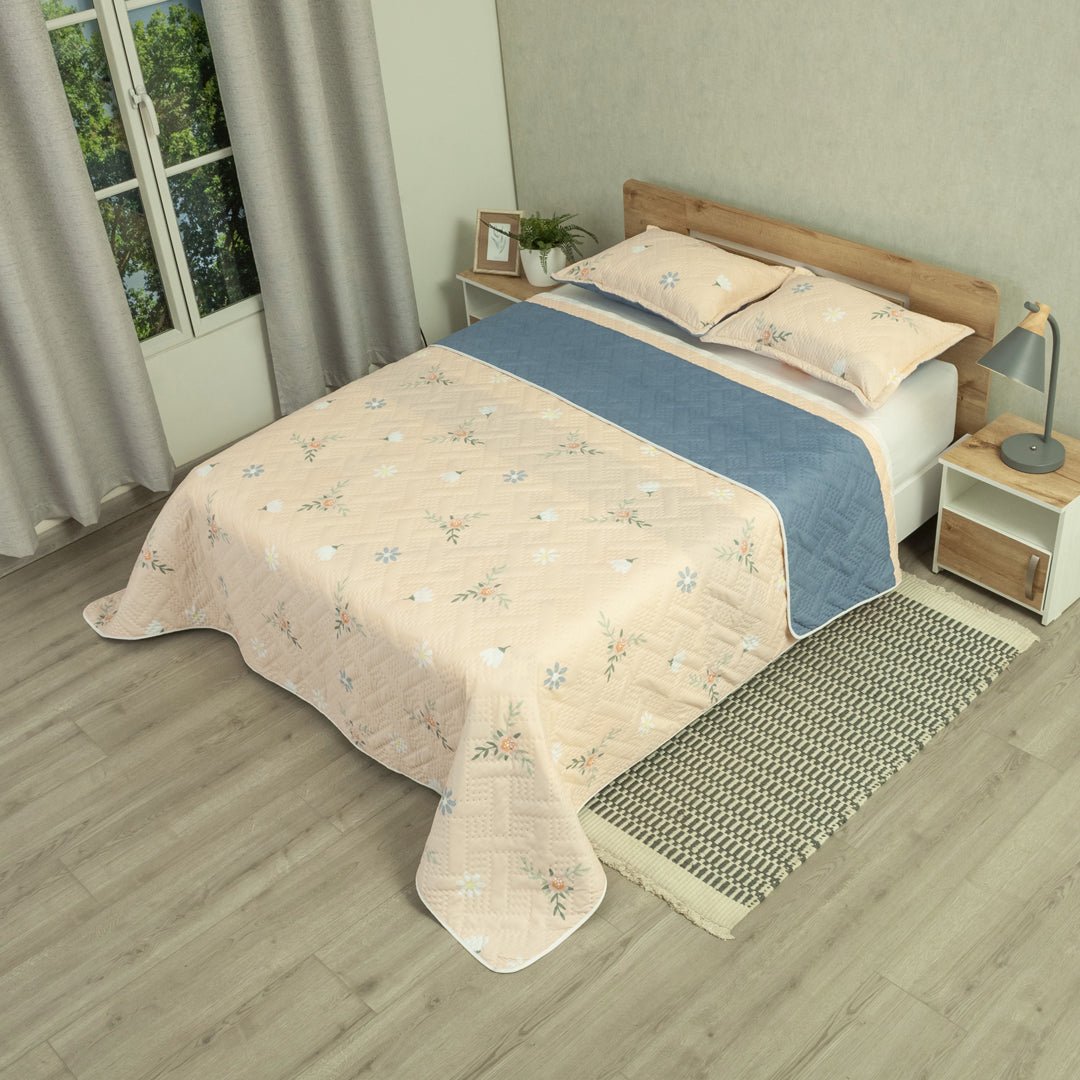 Cubrelecho Doble Faz Style Jardín Beige Claro y Azul Oscuro para Cama Semidoble 120 X 190 Cm de Hojas - TENDIDOS Y CUBRELECHOS | Bylmo