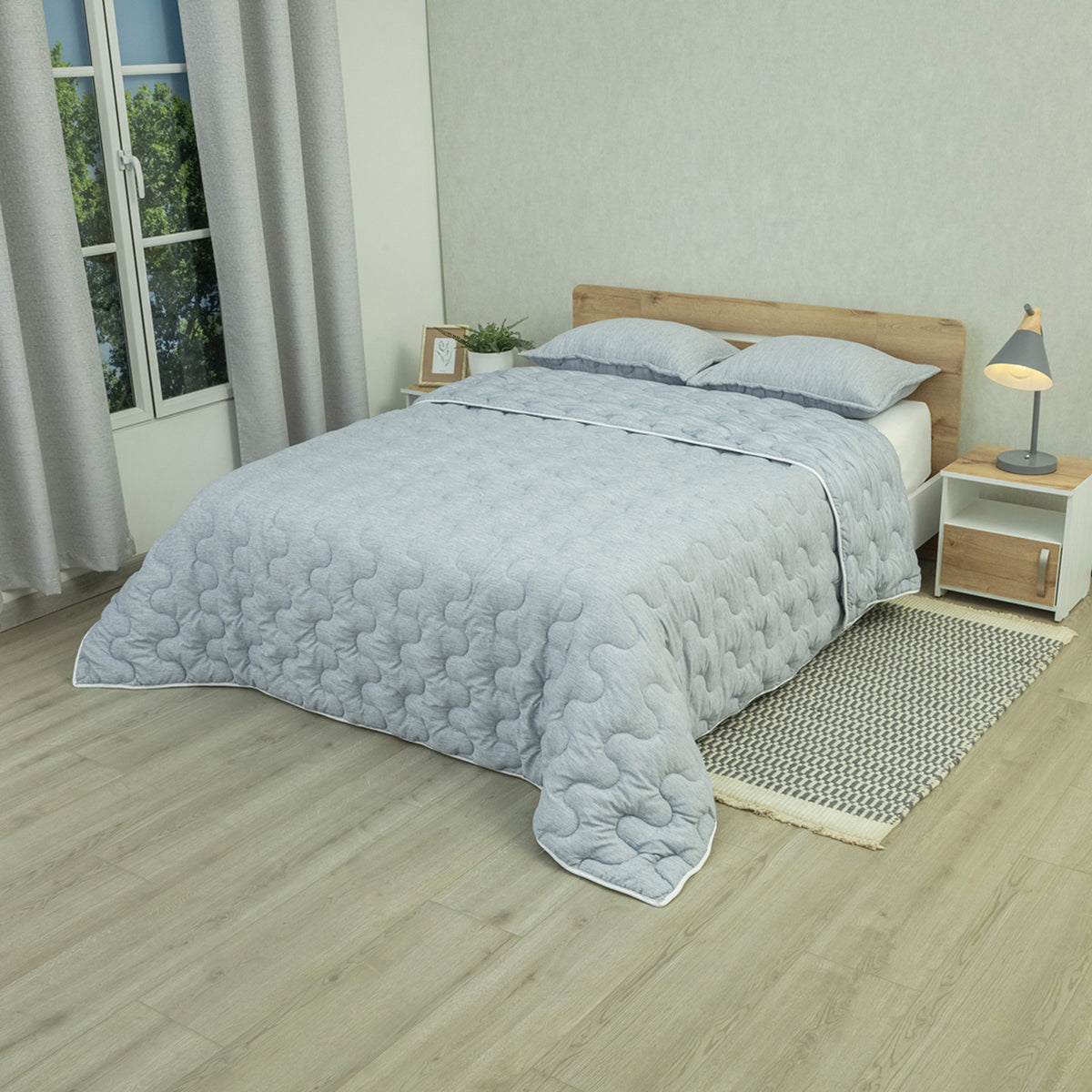 Cubrelecho acolchado azul Equilibrio queen 160x190 cm doble faz microfibra