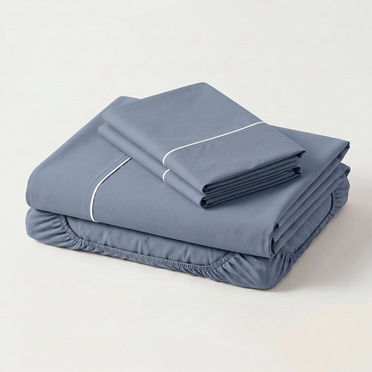 Sábana Básicos azul para cama doble 140x190 cm en microfibra suavizada con elástico