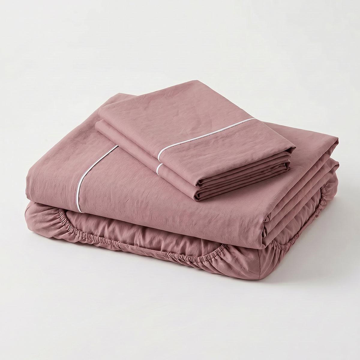 Sábana Básicos sencilla palo de rosa en microfibra suavizada 100x190 cm con elástico