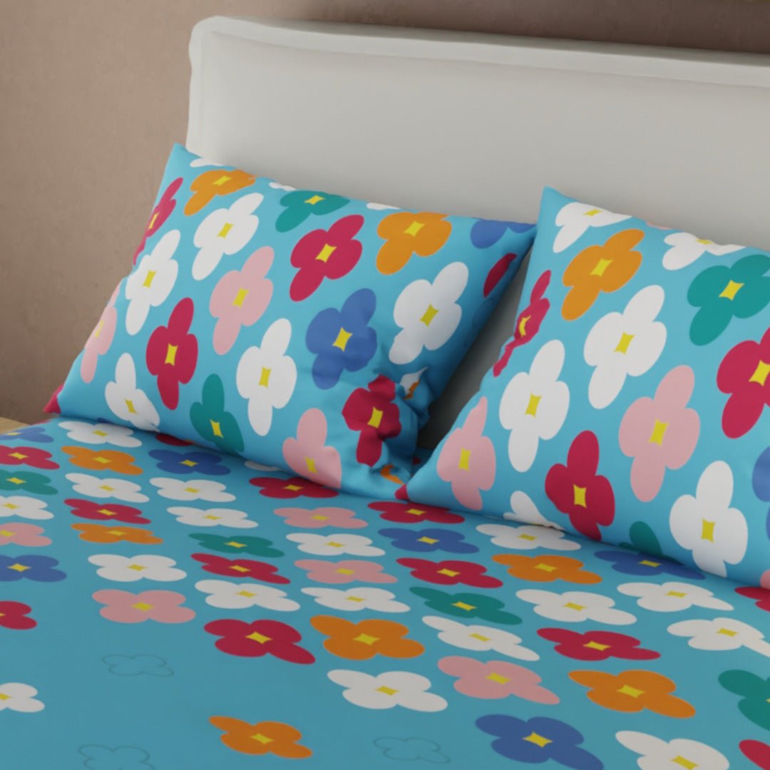 Juego de Sabanas Fiesta Floral Azul y Multicolor Para Cama Sencilla 100 X 190 Cm de Flores Y Lineas - SABANAS | Bylmo