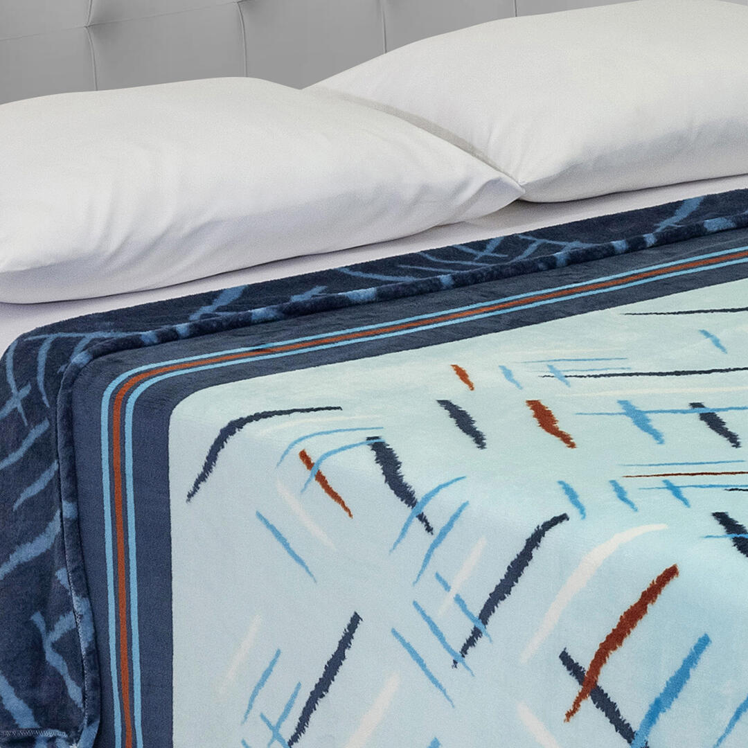 Cobija Piel de Durazno Azul Claro y Azul 180x200cm de Lineas Entrelazadas - COBIJAS Y MANTAS | Bylmo