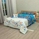 Cubrelecho Súper Acolchado Vórtice Nocturno Blanco y Azul para Cama Doble 140 X 190 Cm de Espiral - TENDIDOS Y CUBRELECHOS | Bylmo