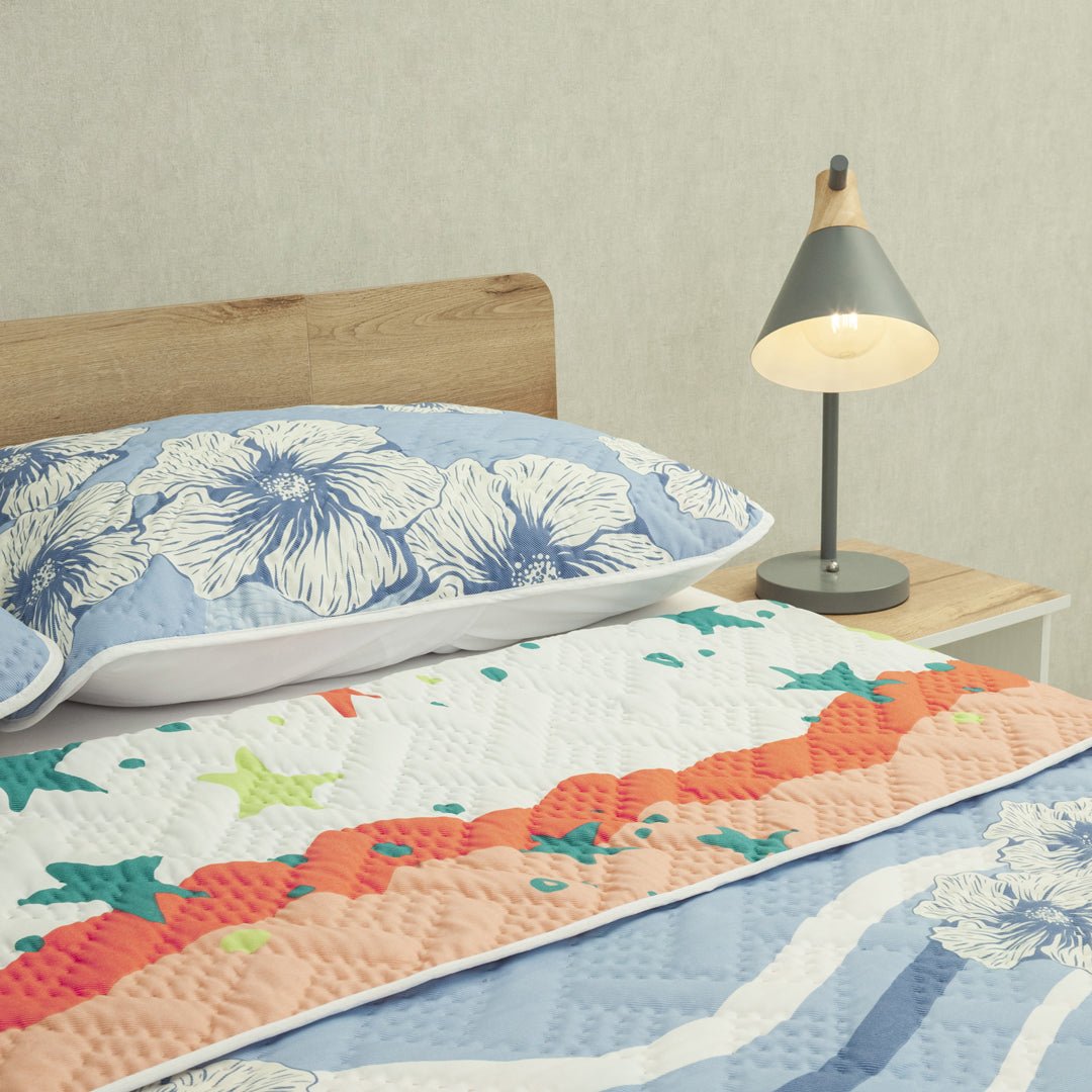 Cubrelecho Doble Faz Ecos de Cielo Naranja y Azul para Cama Doble 140 X 190 Cm Prensado de Estrellas Y Flores - TENDIDOS Y CUBRELECHOS | Bylmo