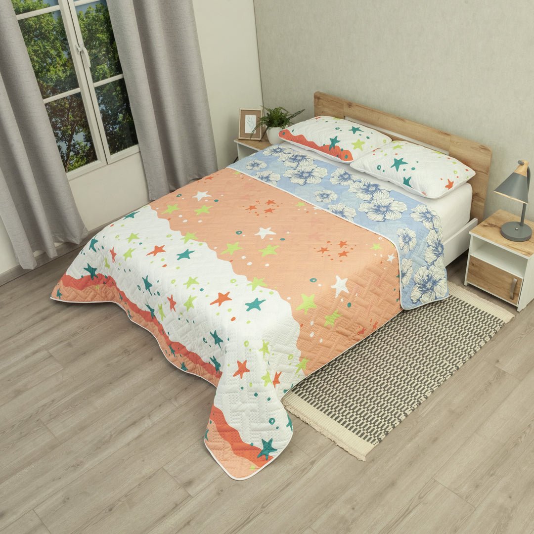 Cubrelecho Doble Faz Ecos de Cielo Naranja y Azul para Cama Doble 140 X 190 Cm Prensado de Estrellas Y Flores - TENDIDOS Y CUBRELECHOS | Bylmo