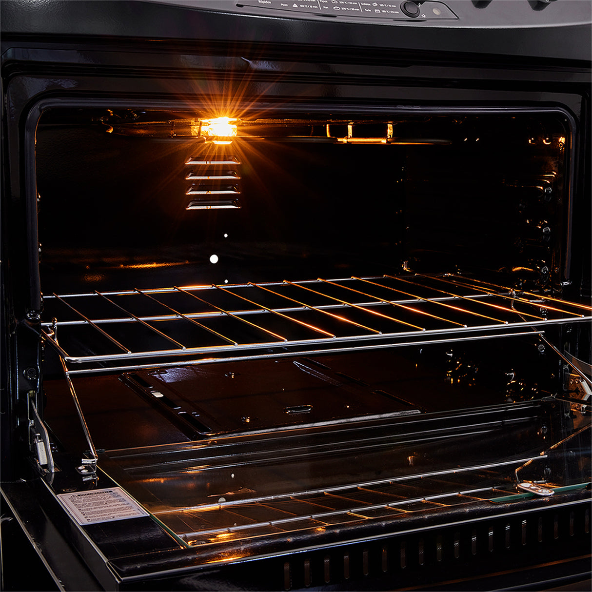 Estufa Haceb Negro 65.5x98.5cm Para Gas Natural con Cuatro Quemadores y con Horno - ESTUFAS | Bylmo