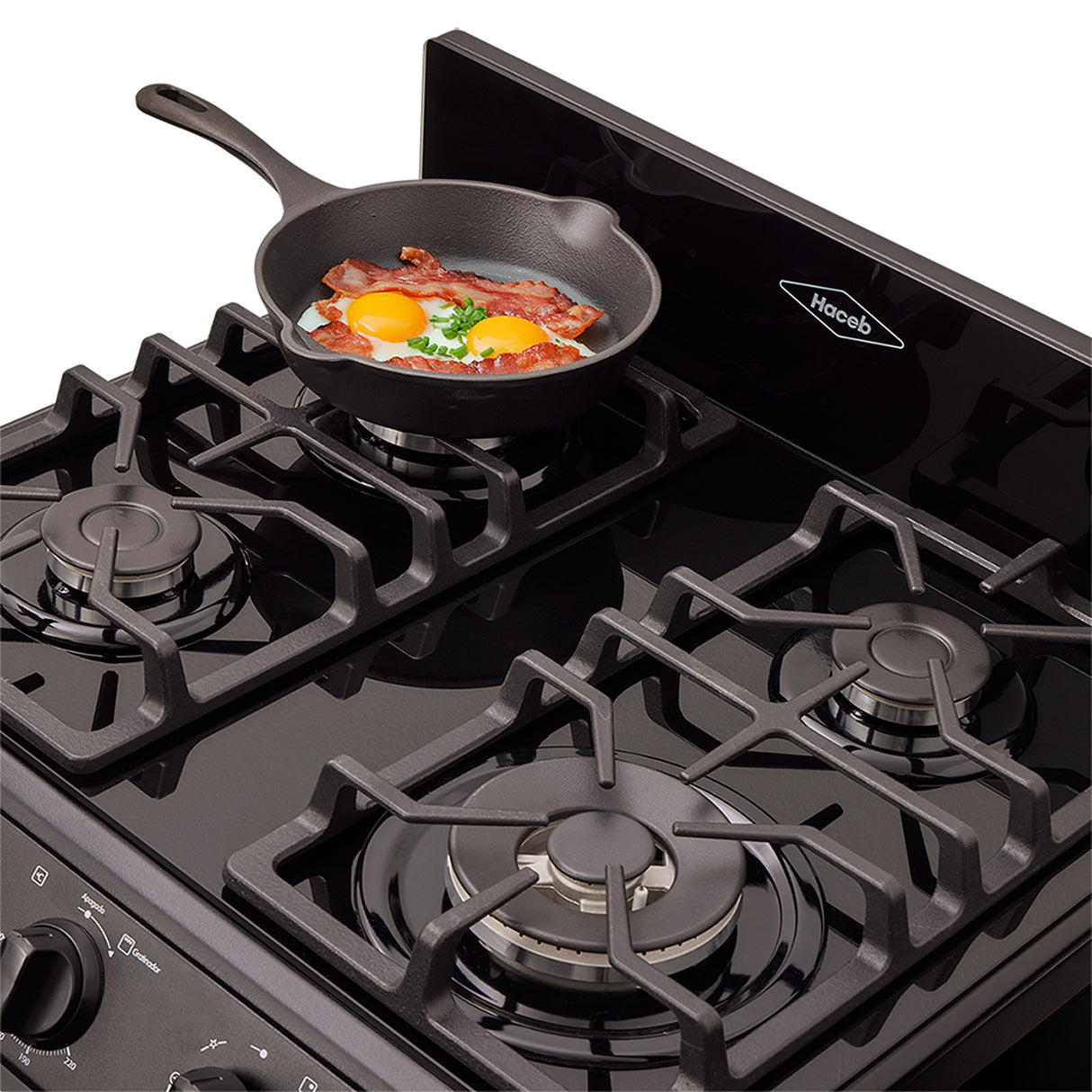 Estufa Haceb Negro 65.5x98.5cm Para Gas Propano con Cuatro Quemadores y con Horno - ESTUFAS | Bylmo