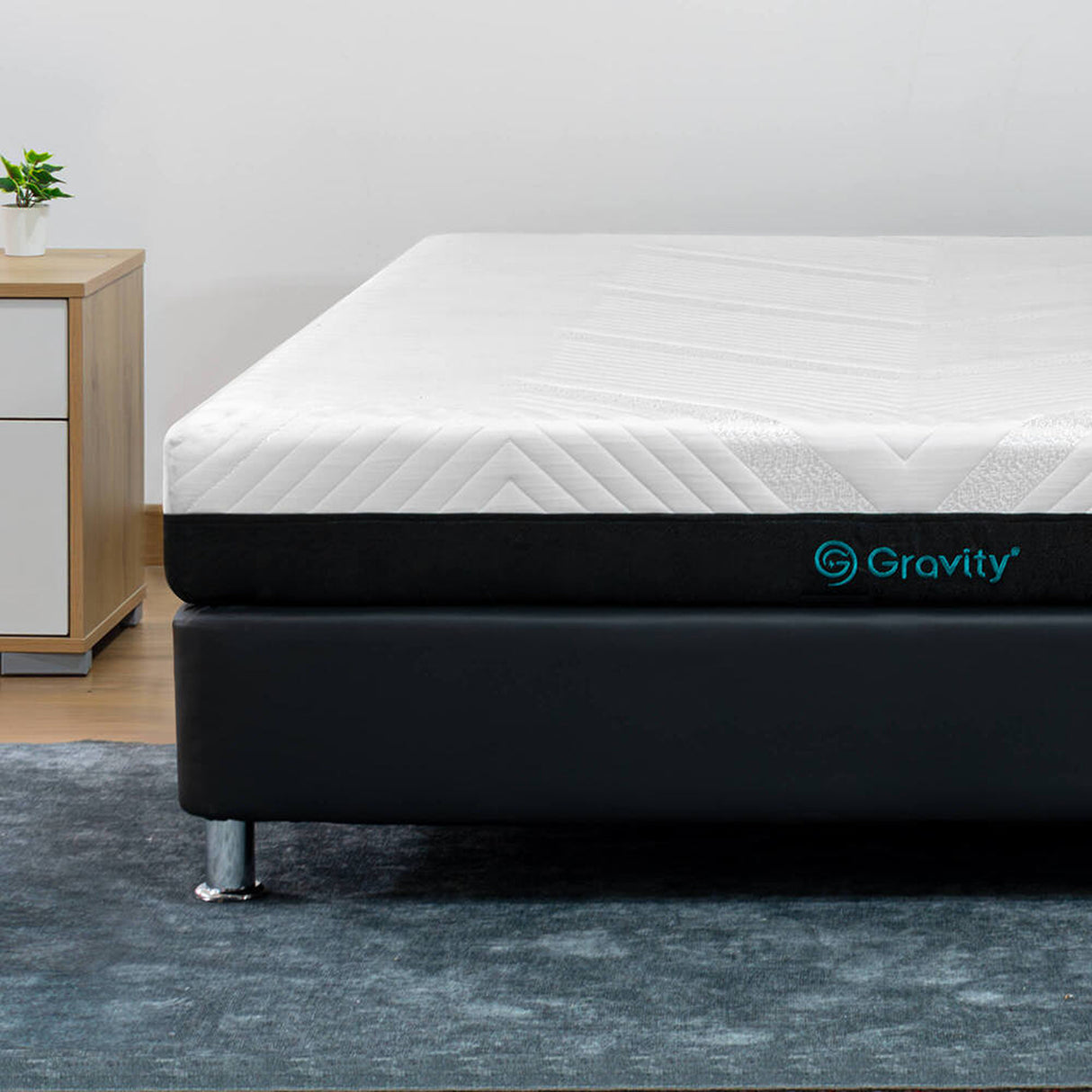 Combo Colchón Enrollado Gravity E18 Blanco Sencillo 100 X 190 Cm Ortopedico Firmeza Firme con Una Almohada Stellar Soft y Un Protector de Colchón