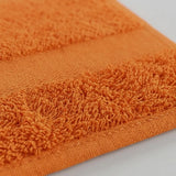 Toalla de manos naranja Elegant 40x70 cm en algodón 100 400 gsm