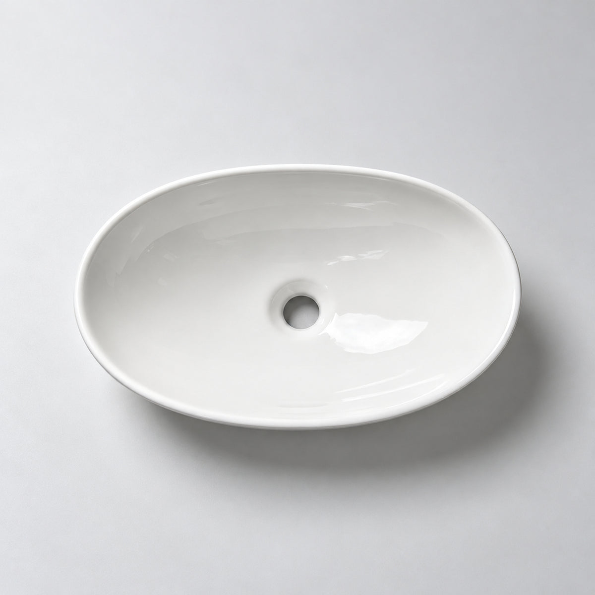 Lavamanos de sobreponer ovalado blanco en cerámica 41x14 cm