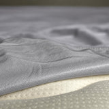 Protector de colchón semidoble gris impermeable terry 120x190 cm